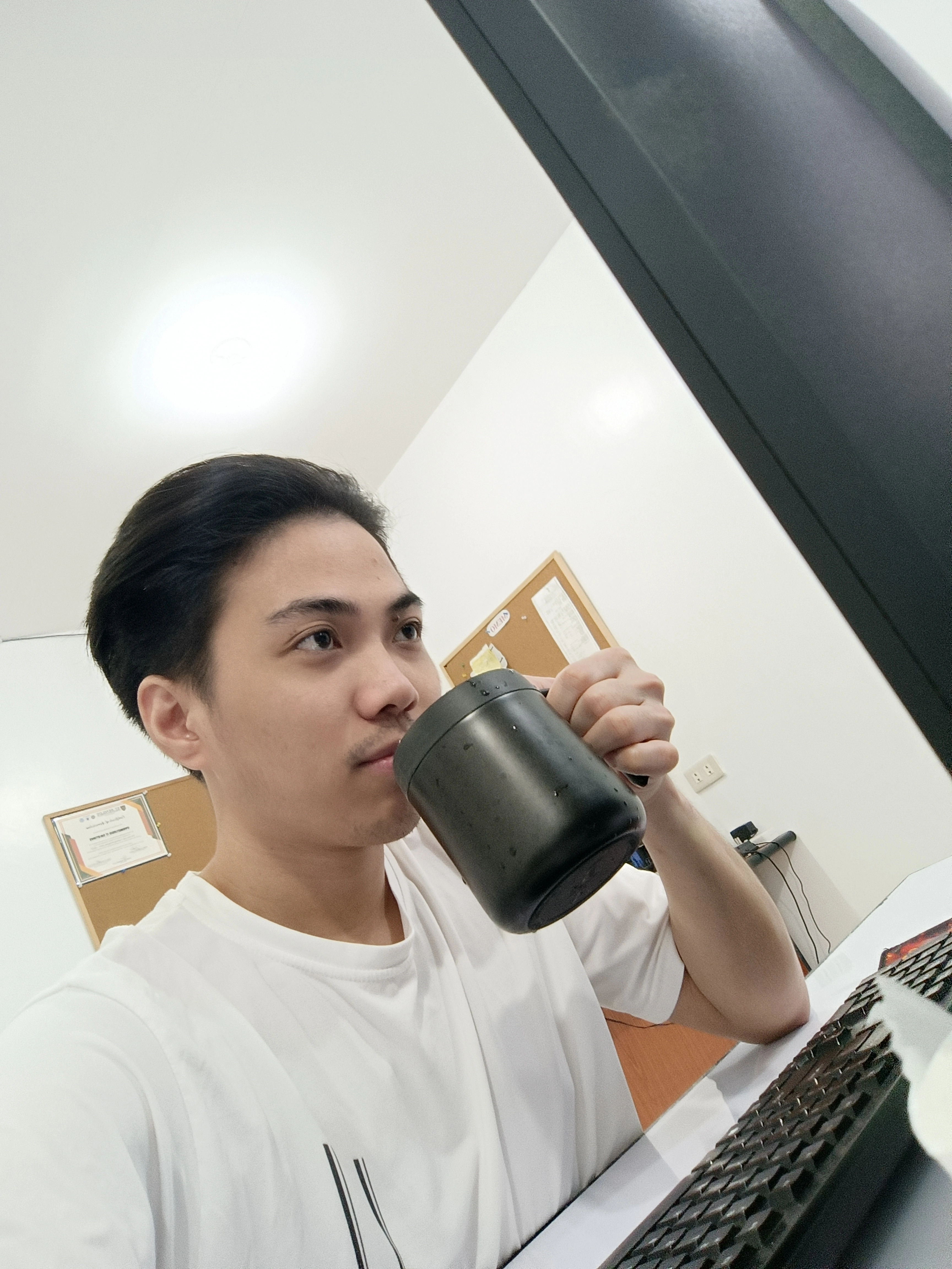 AJ Iñigo working at his desk